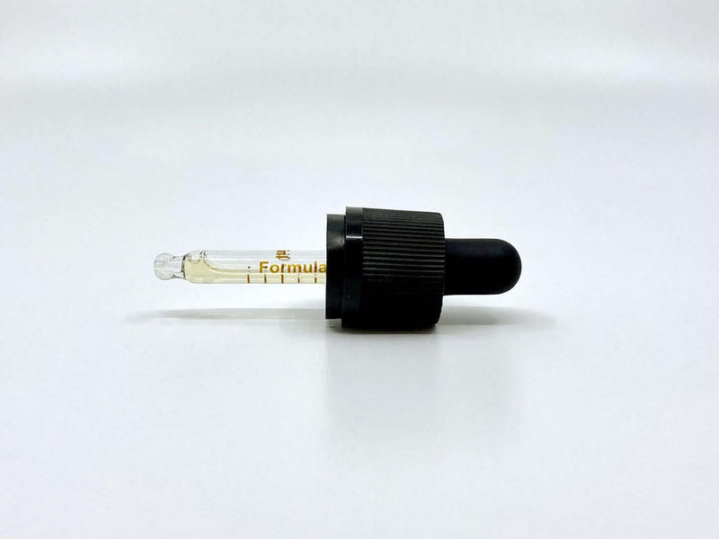 Formula Swiss CBD oil pipette on a white background